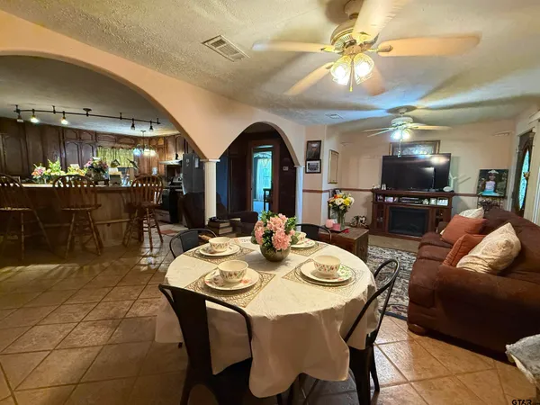 a view of a dining room with furniture