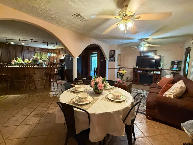 a view of a dining room with furniture
