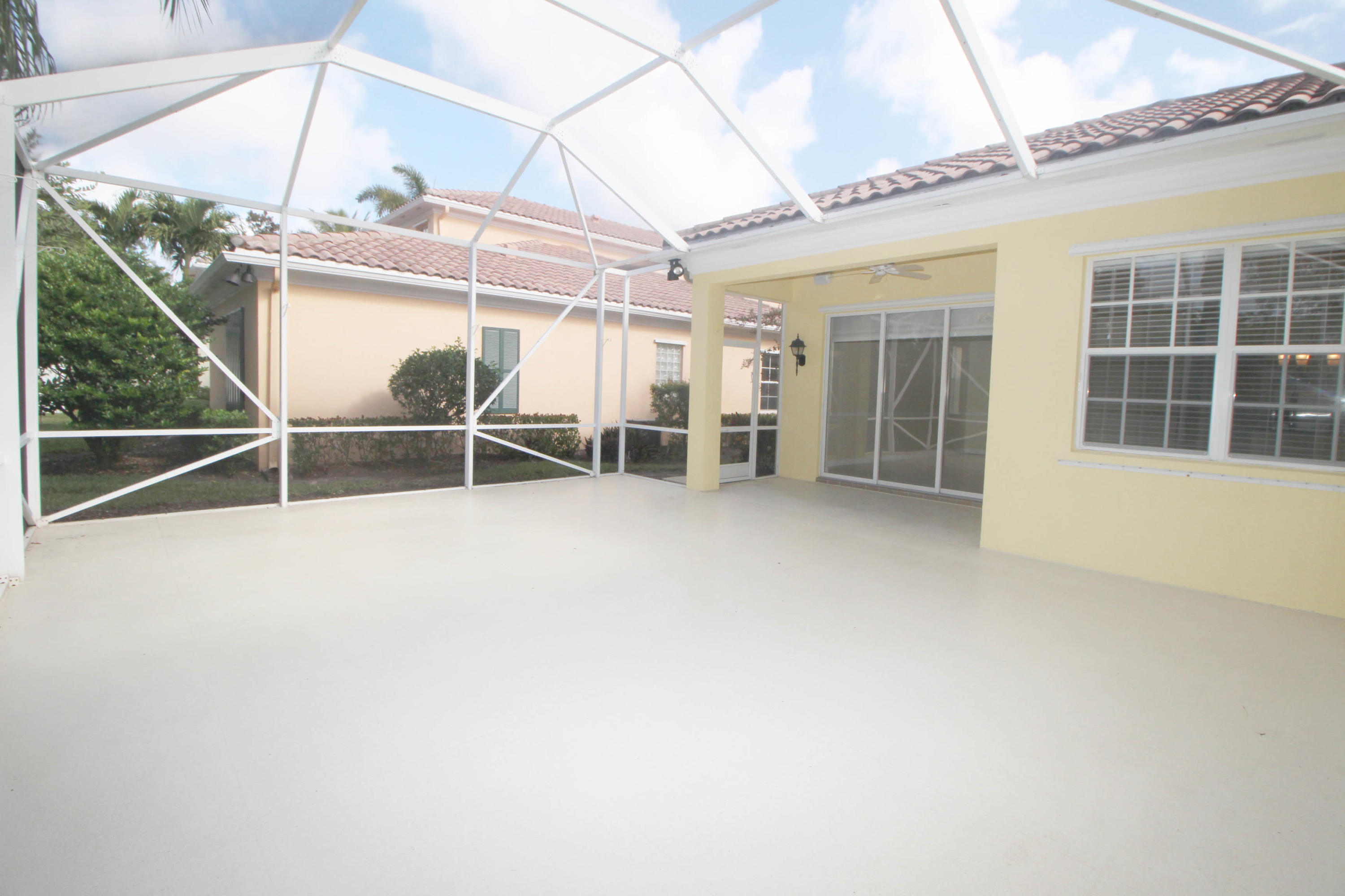 256 San Remo Drive Jupiter, FL 33458 - Photo 35 of 66 a view of a room with wooden floor and windows