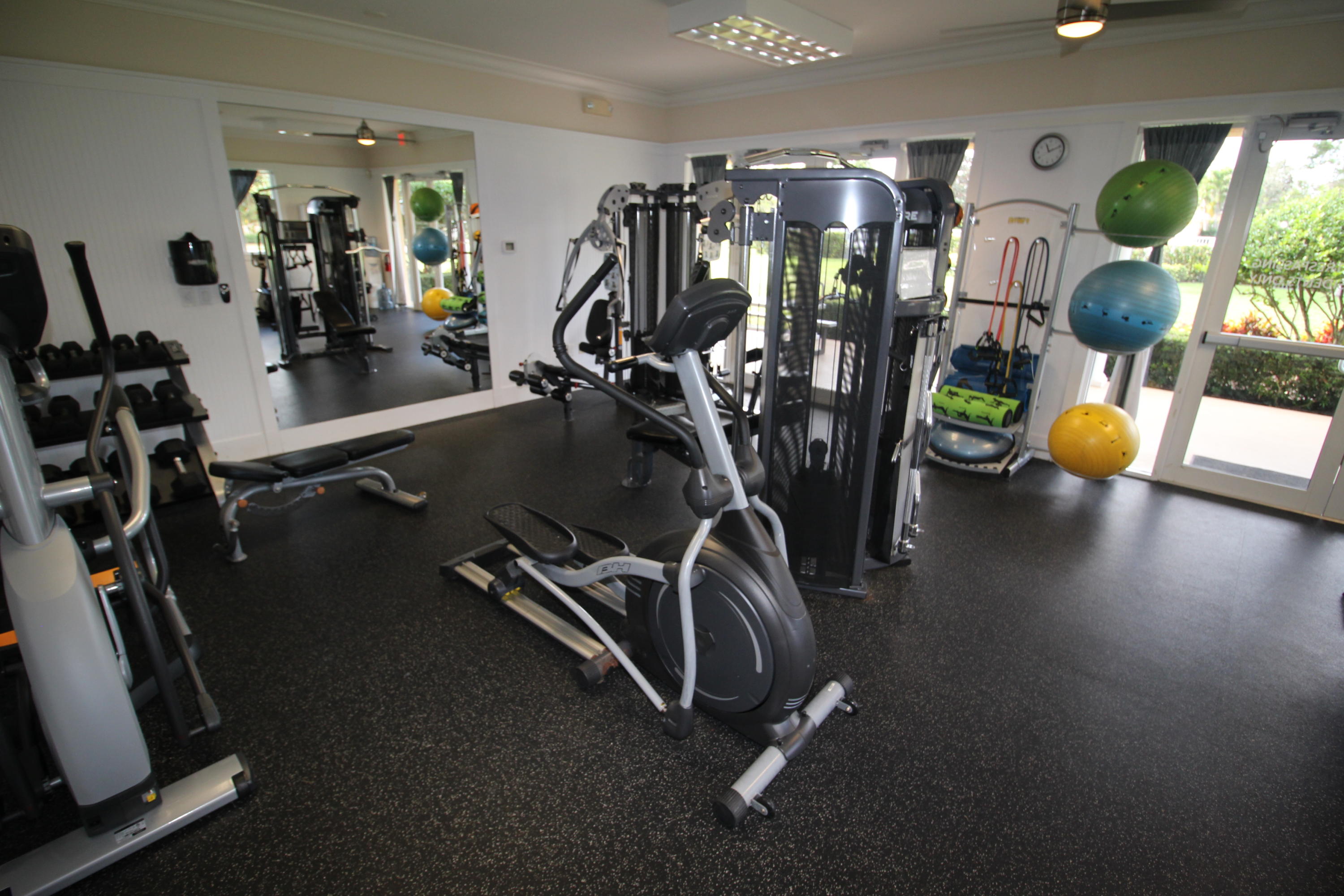 256 San Remo Drive Jupiter, FL 33458 - Photo 65 of 66 a view of a room with gym equipment