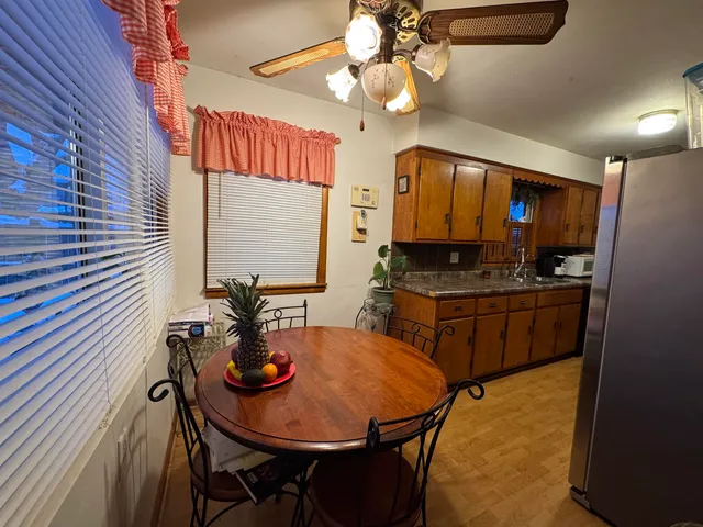 a view of a dining room with furniture