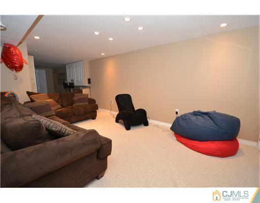 38 Harvard Road Old Bridge, NJ 08859 - Photo 12 of 13 a living room with furniture and wooden floor