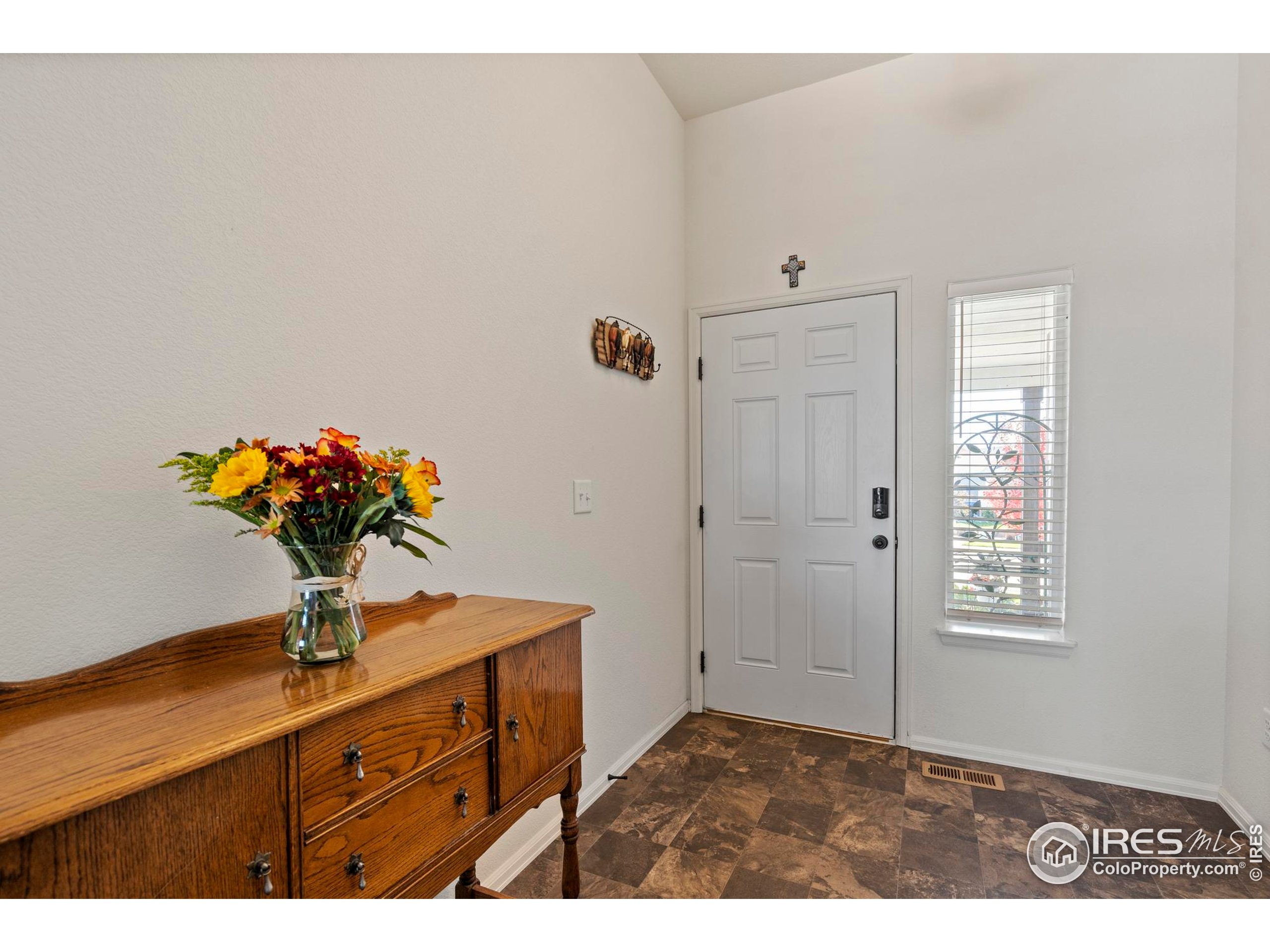 941 Barasingha Street Severance, CO 80550 - Photo 7 of 46 a bathroom with a sink a vanity and a mirror