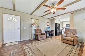 30263 Old Joseph Road Hockley, TX 77447 - Photo 8 of 10 a living room with furniture and a chandelier
