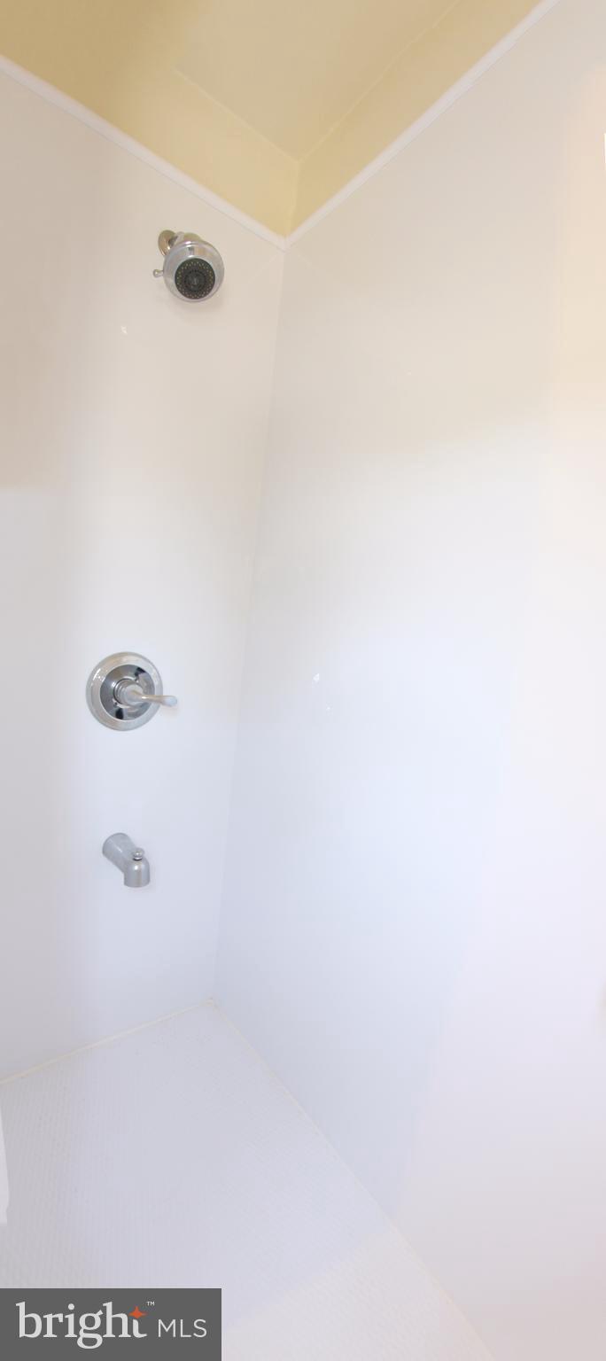 204 Old Riverside Road Baltimore, MD 21225 - Photo 10 of 24 a bathroom with a shower