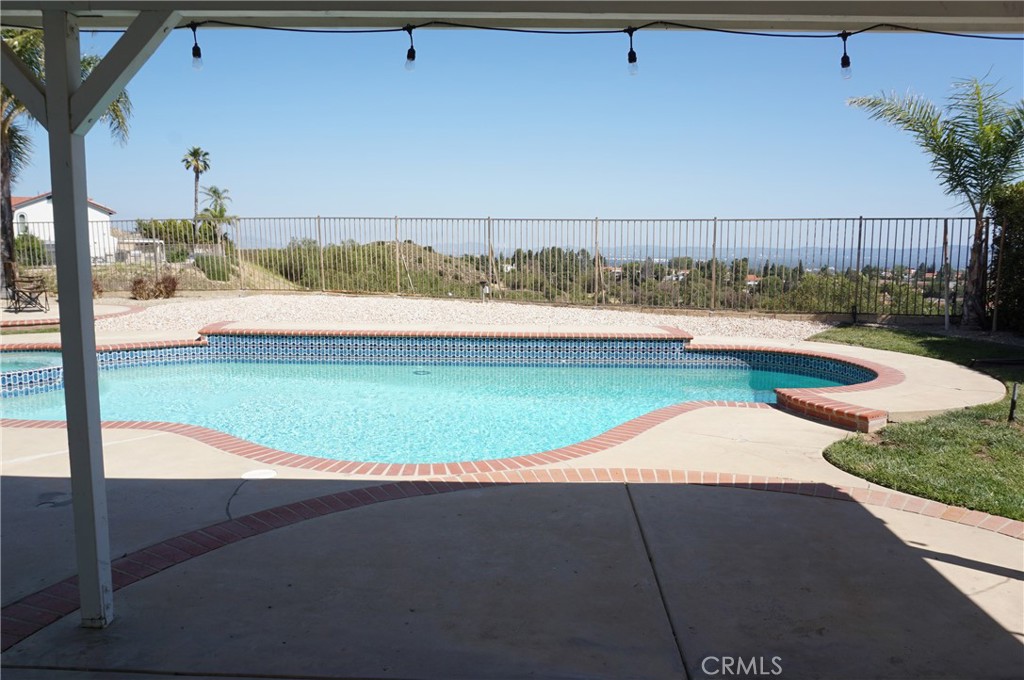 19584 Shadow Glen Circle Porter Ranch, CA 91326 - Photo 42 of 72 a view of a swimming pool and an outdoor space