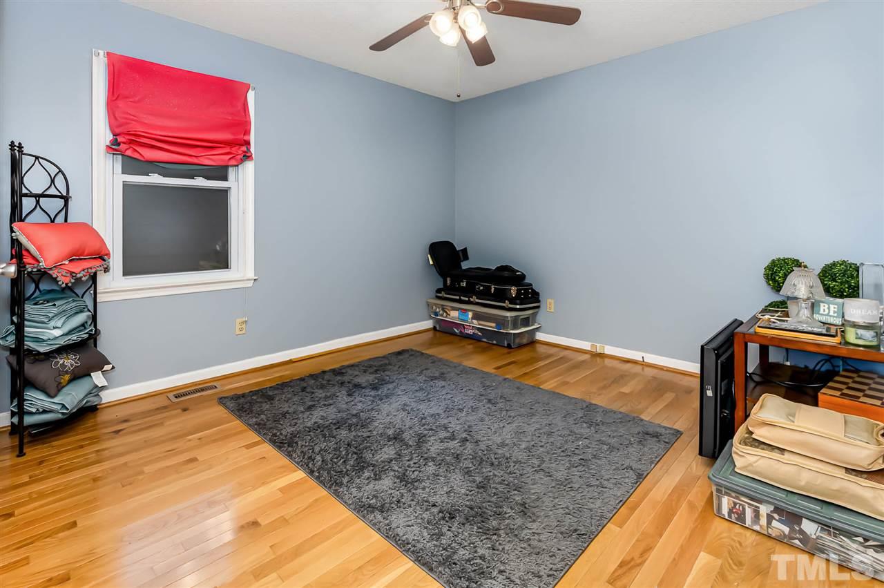 113 Tanning Ridge Drive Dunn, NC 28334 - Photo 15 of 28 a living room with furniture and a rug