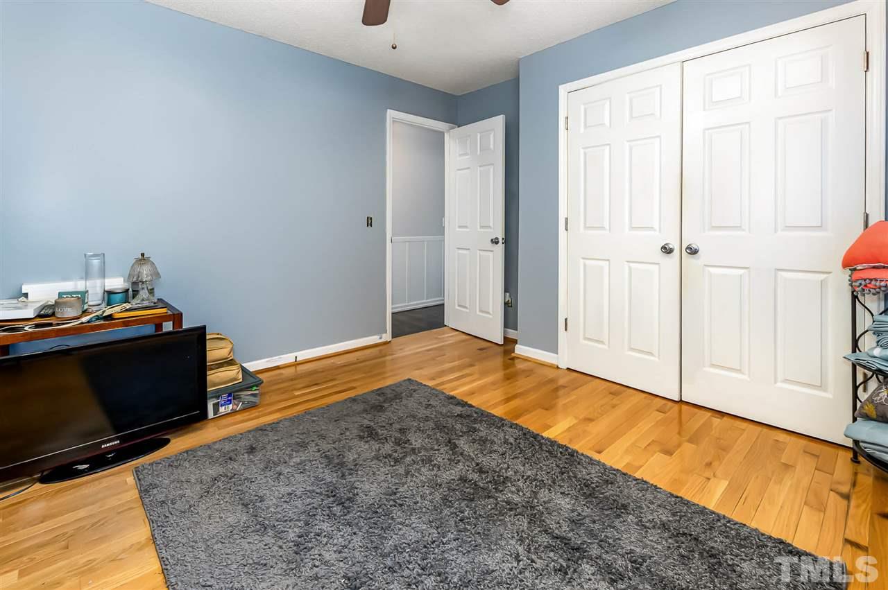 113 Tanning Ridge Drive Dunn, NC 28334 - Photo 16 of 28 a bedroom with a bed and a window