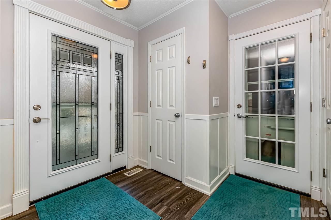 113 Tanning Ridge Drive Dunn, NC 28334 - Photo 7 of 28 a view of front door of a house