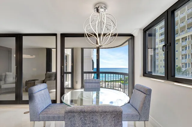 a bedroom with a large bed and a couch