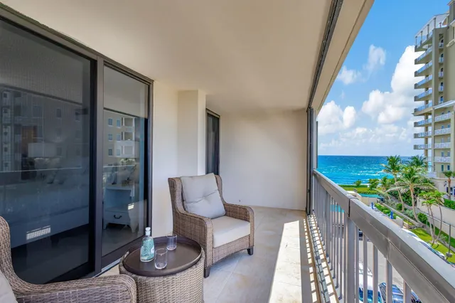 a bathroom with a double vanity sink mirror and shower