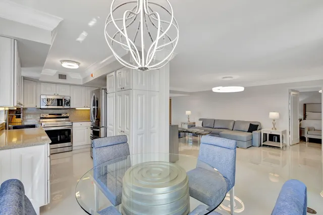 a bathroom with a double vanity sink mirror double and shower