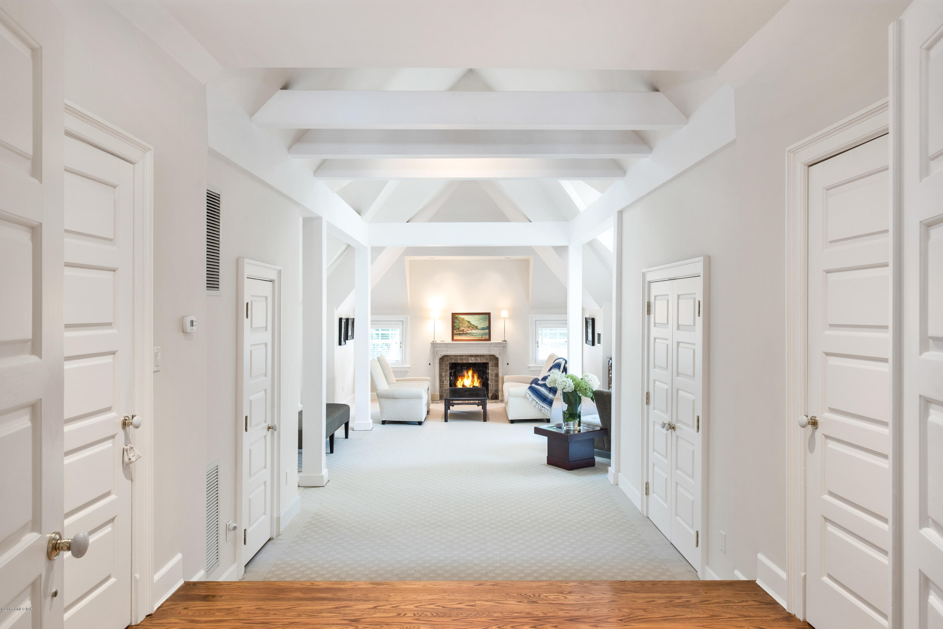 147 Byram Shore Road Greenwich, CT 06830 - Photo 10 of 19 a view of a livingroom with tub and windows