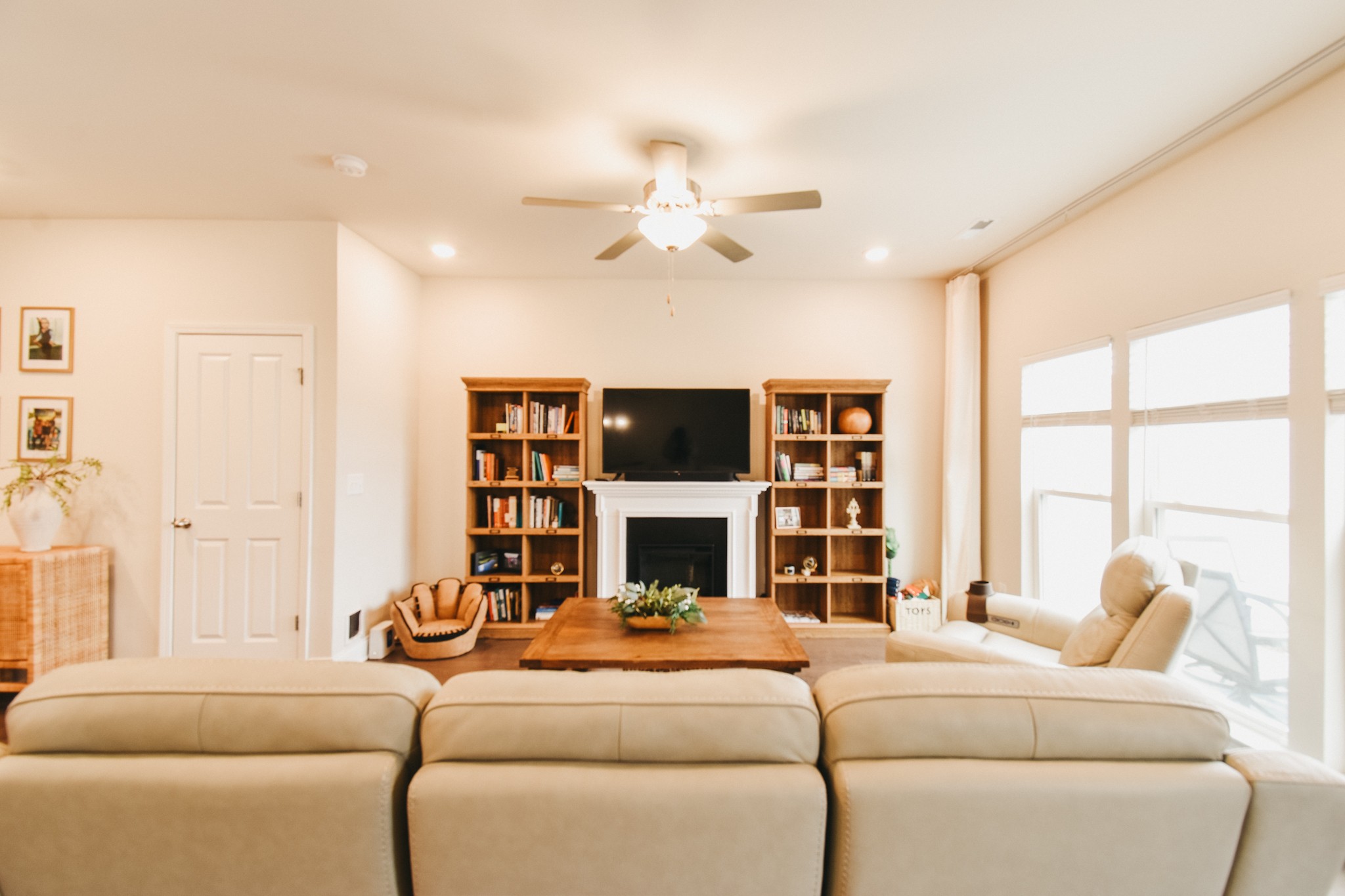 1251 June Wilde Ridge Spring Hill, TN 37174 - Photo 23 of 75 a living room with furniture a fireplace and a flat screen tv