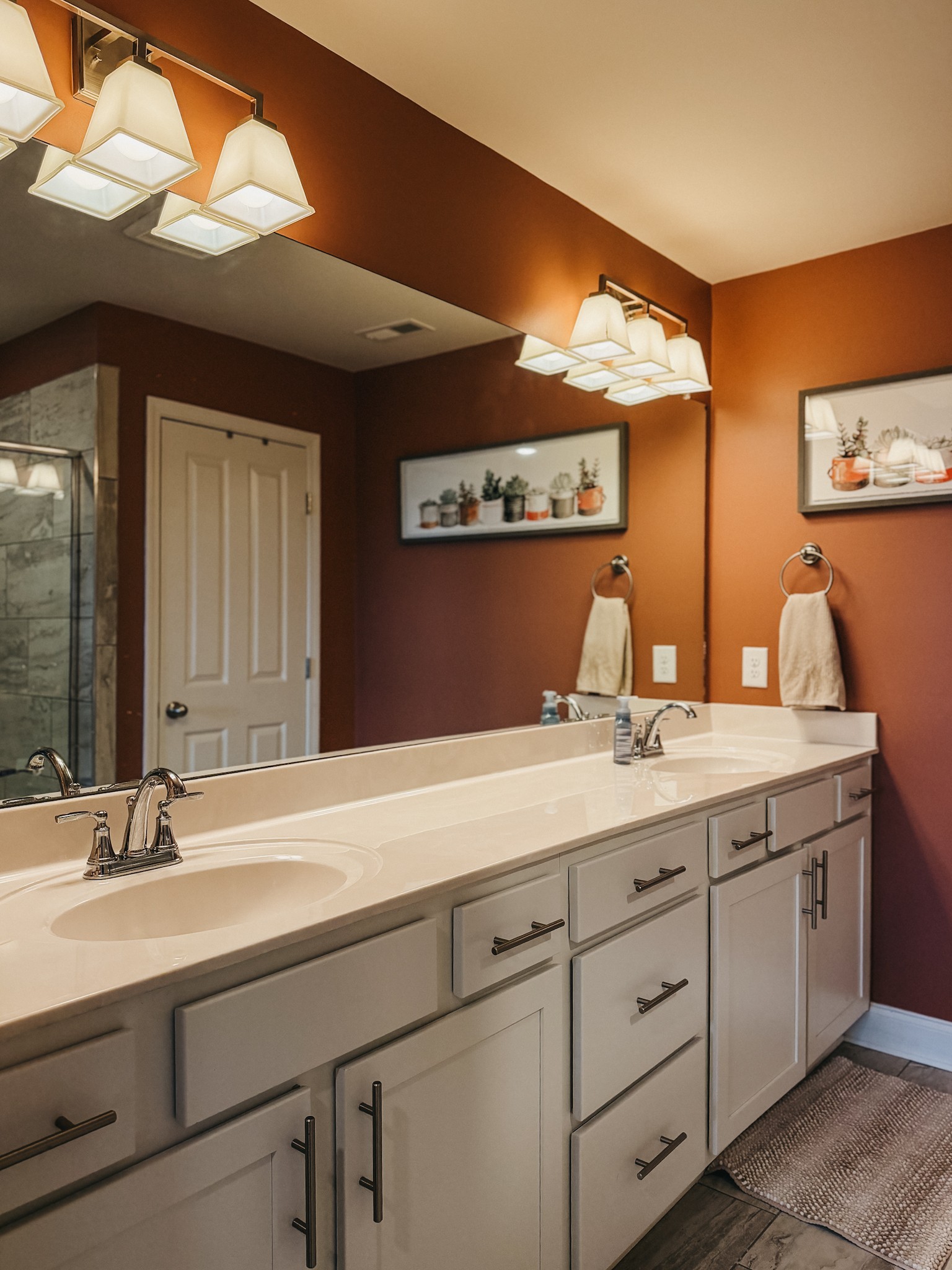 1251 June Wilde Ridge Spring Hill, TN 37174 - Photo 44 of 75 a bathroom with a double vanity sink and a mirror