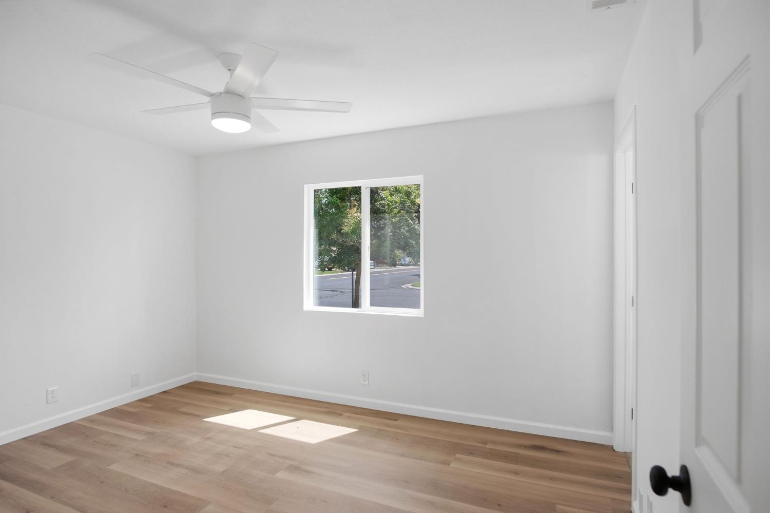 1451 Kent Way Modesto, CA 95355 - Photo 23 of 37 an empty room with a window
