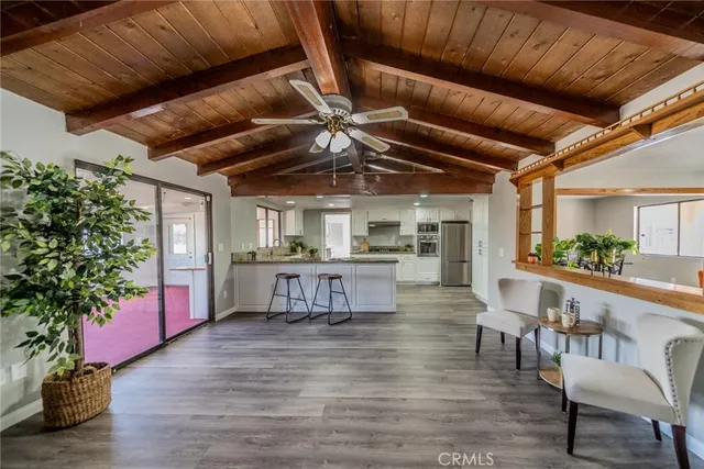 a view of a kitchen and dining room