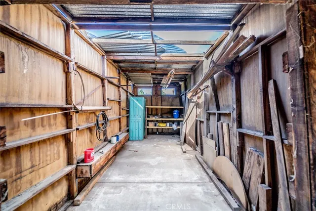 a view of an empty room with a balcony