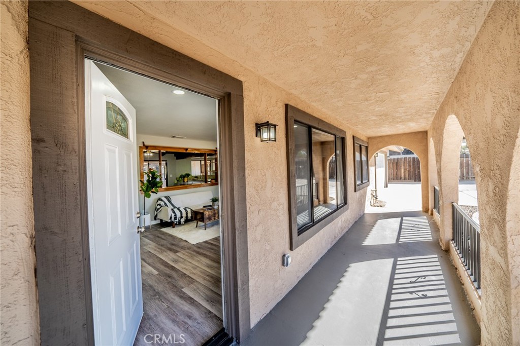 17470 Krameria Avenue Riverside, CA 92504 - Photo 4 of 53 a view of a hallway view with three rooms