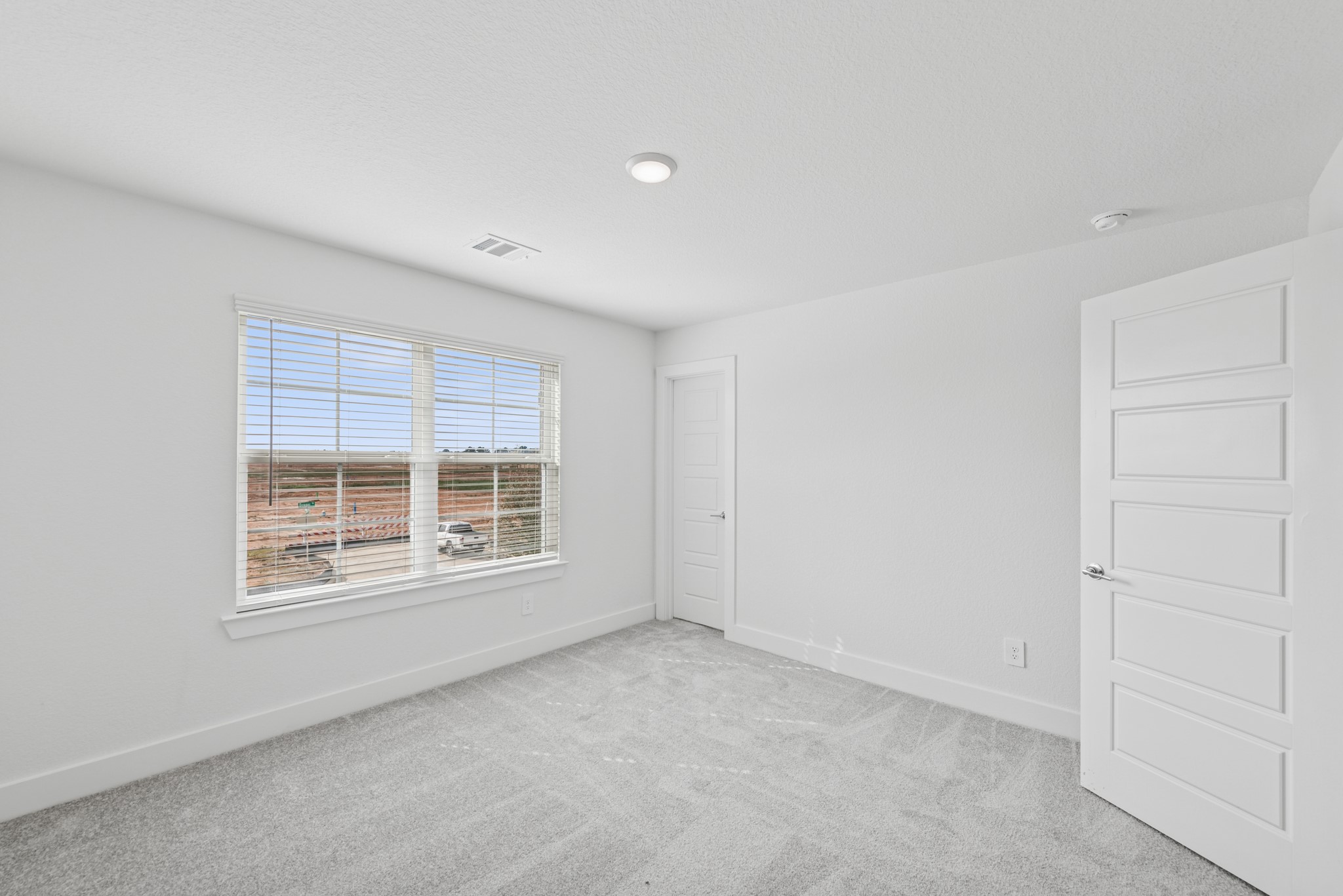 20518 Draper Road Tomball, TX 77377 - Photo 40 of 46 a view of an empty room with a window