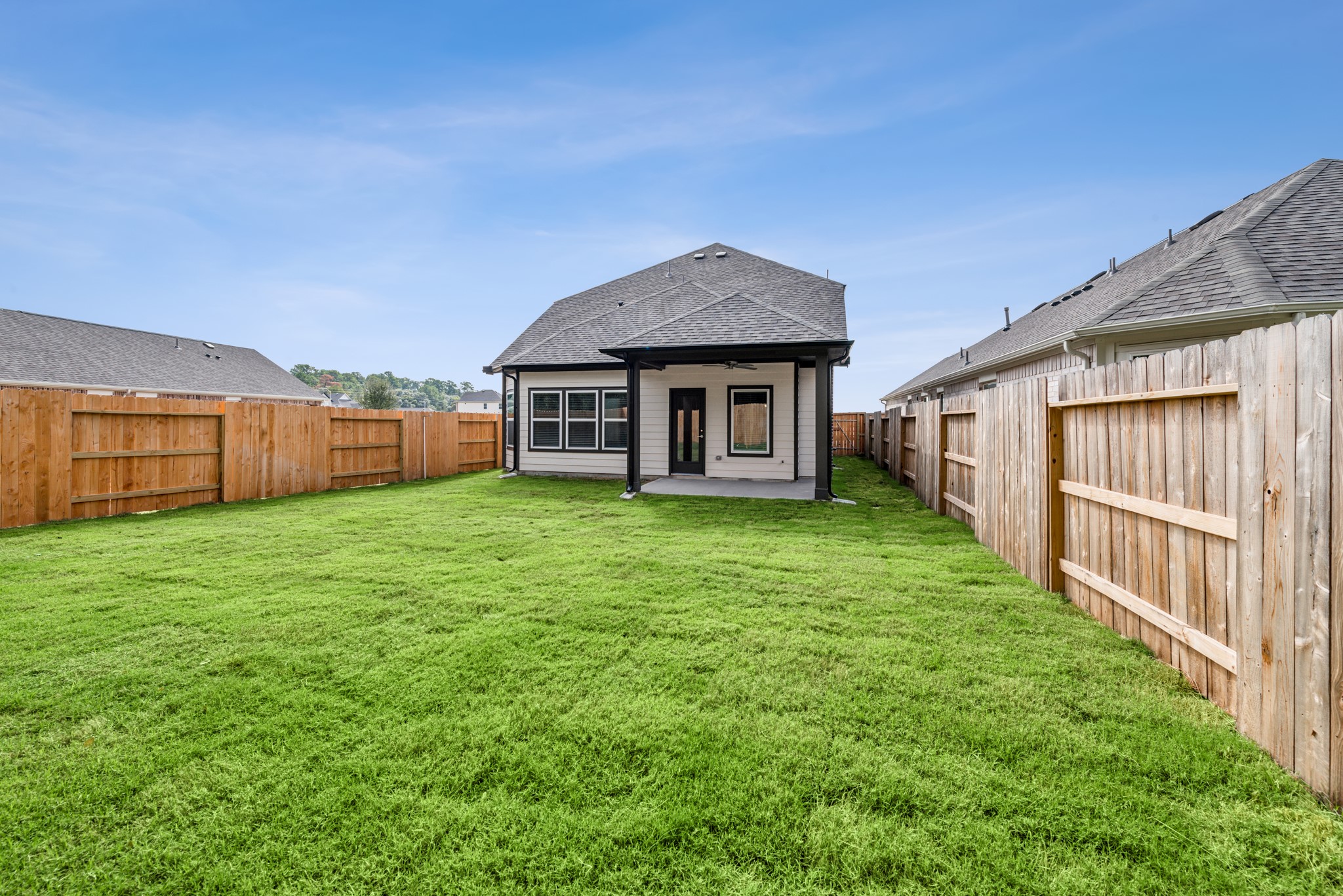 20518 Draper Road Tomball, TX 77377 - Photo 41 of 46 a view of a house with backyard and porch