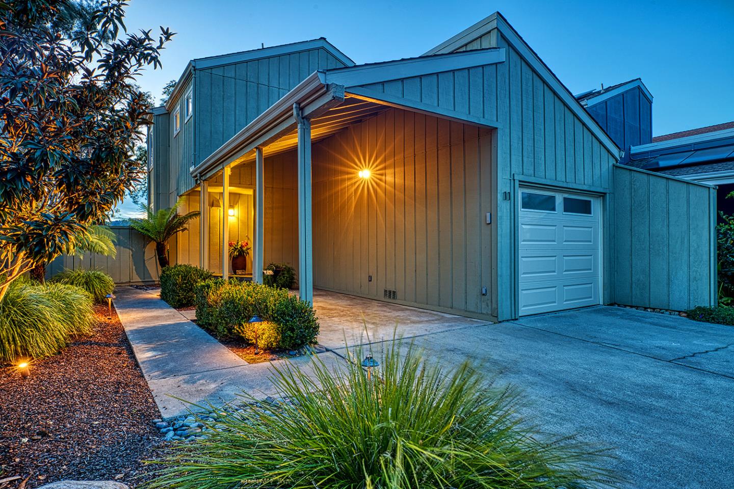 a house view with a garden space