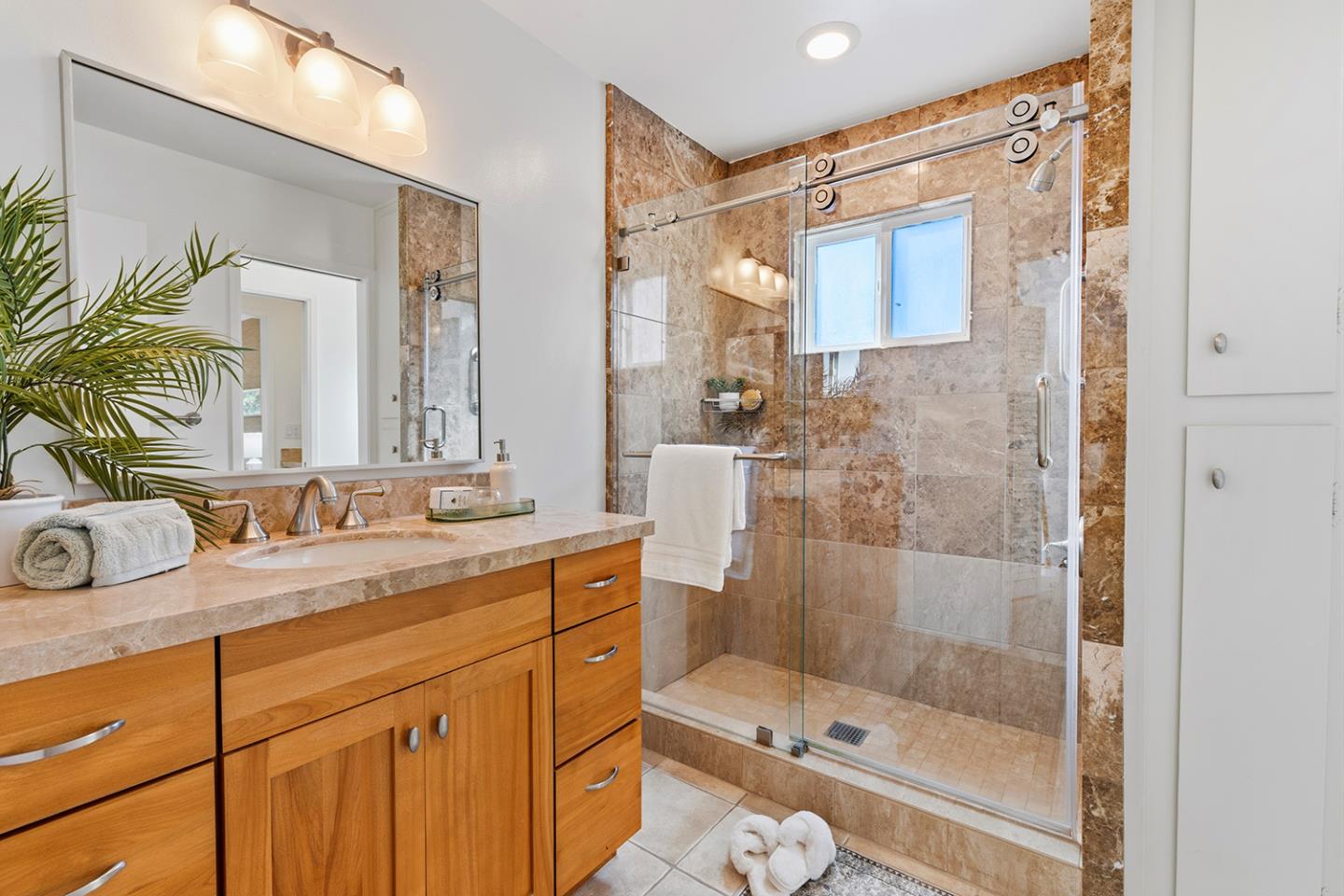 11 Berkeley Court Santa Cruz, CA 95062 - Photo 25 of 50 a bathroom with a granite countertop sink mirror and shower