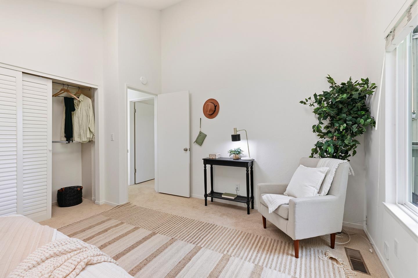 11 Berkeley Court Santa Cruz, CA 95062 - Photo 29 of 50 a living room with furniture and a potted plant