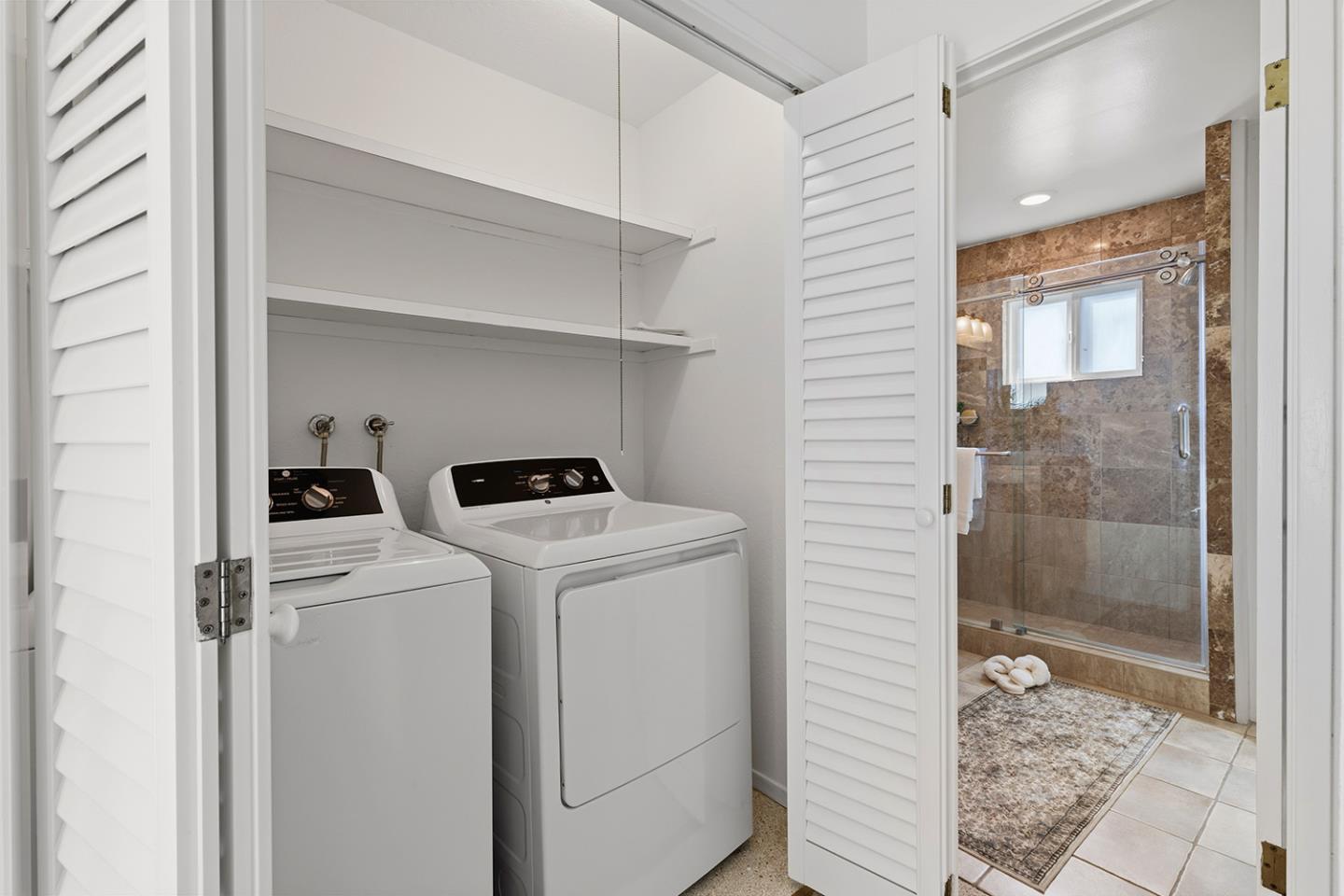 11 Berkeley Court Santa Cruz, CA 95062 - Photo 30 of 50 a view of washer and dryer with in a bathroom
