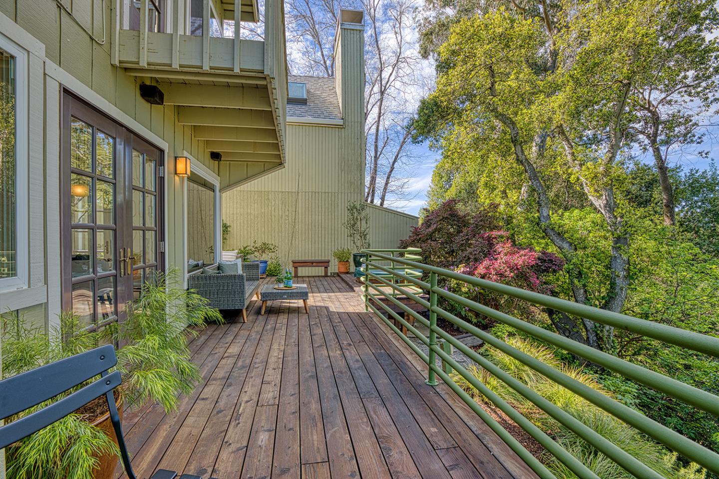 11 Berkeley Court Santa Cruz, CA 95062 - Photo 40 of 50 a balcony with wooden floor and outdoor seating