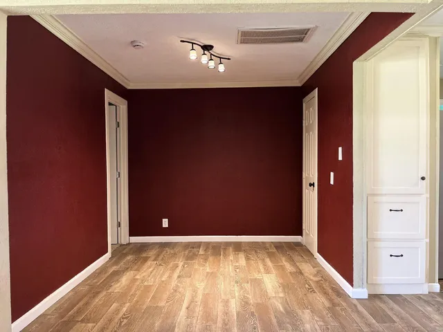 a view of an empty room and window