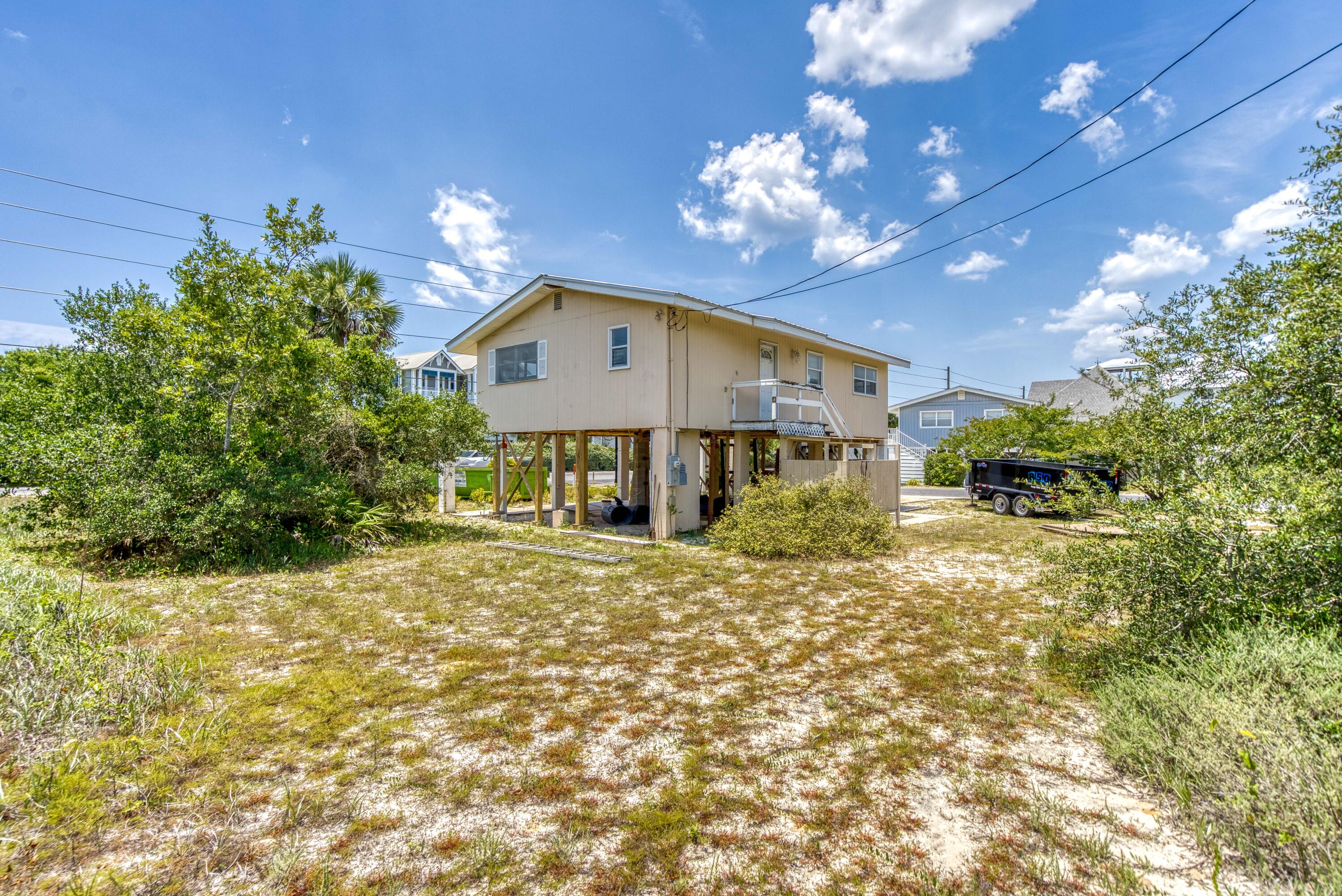 3139 East County Highway 30A Santa Rosa Beach, FL 32459 - Photo 12 of 16 a view of a house with a yard
