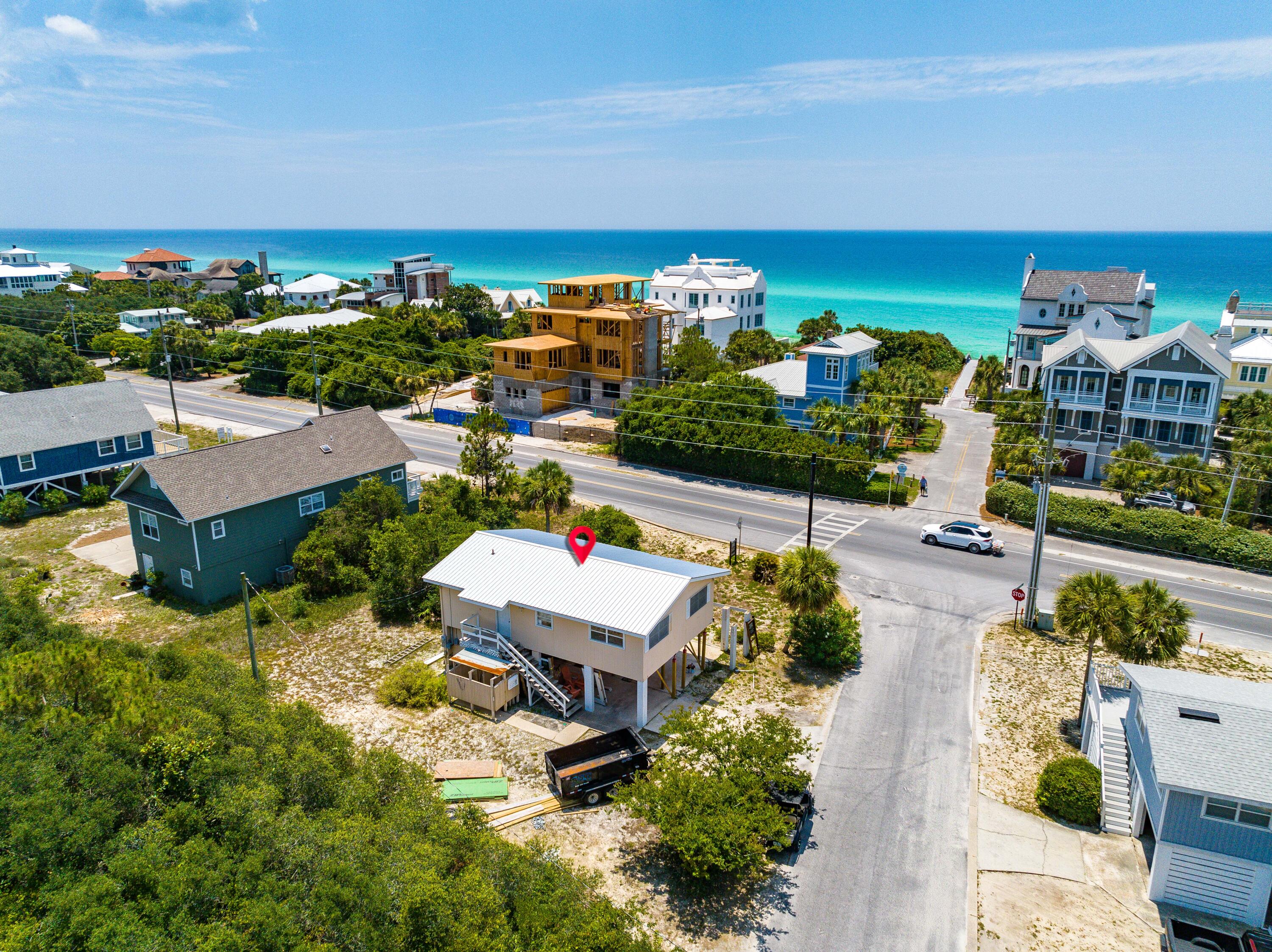 3139 East County Highway 30A Santa Rosa Beach, FL 32459 - Photo 2 of 16 an aerial view of a house with a garden
