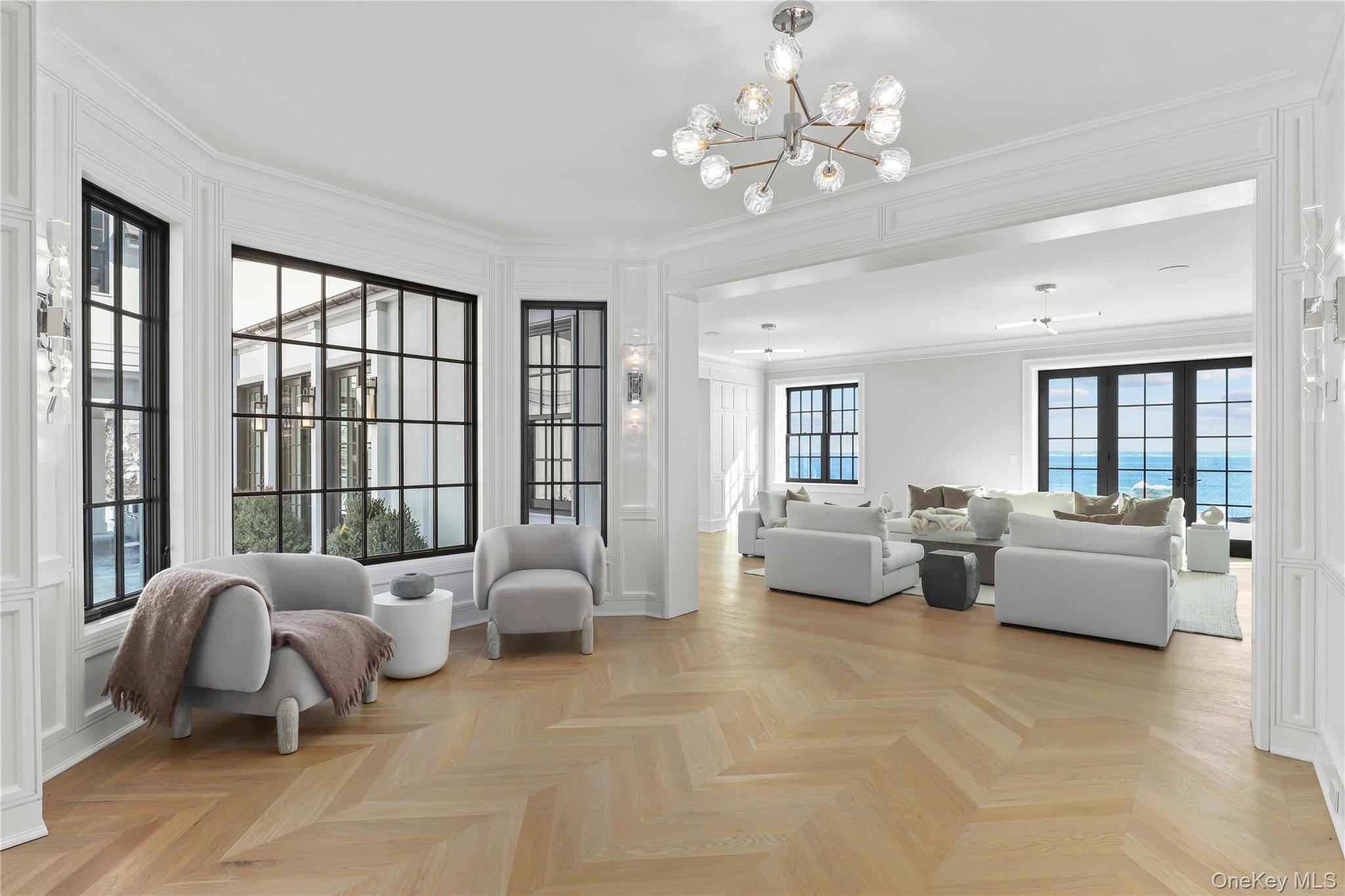 104 Premium Point Larchmont, NY 10538 - Photo 19 of 41 a living room with furniture and a large window