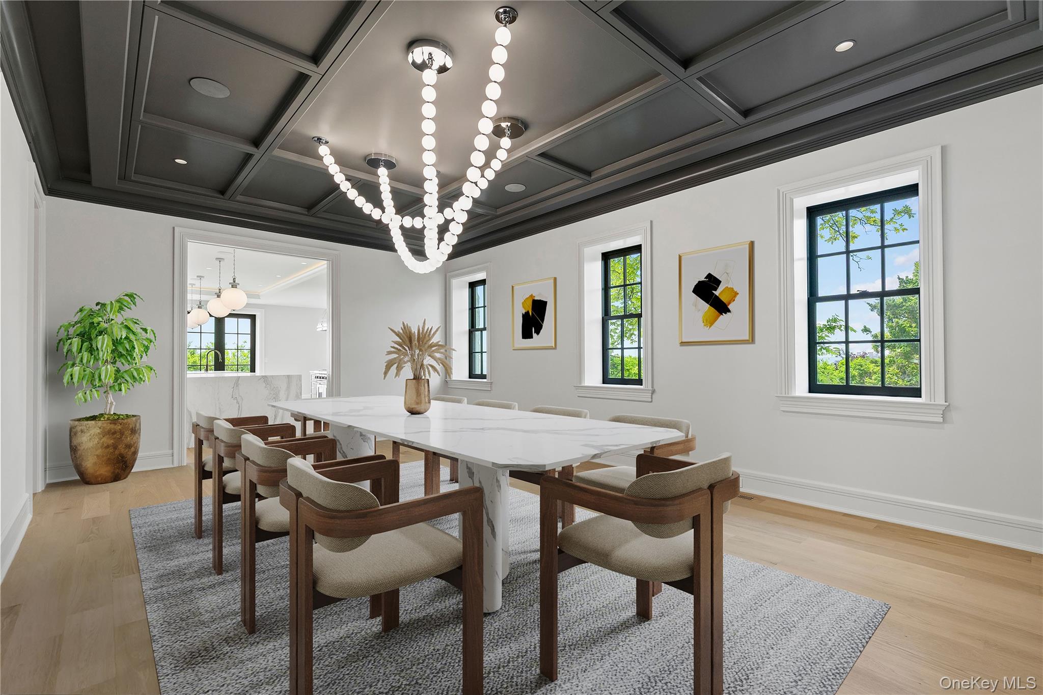 104 Premium Point Larchmont, NY 10538 - Photo 20 of 36 a view of a dining room with furniture and chandelier