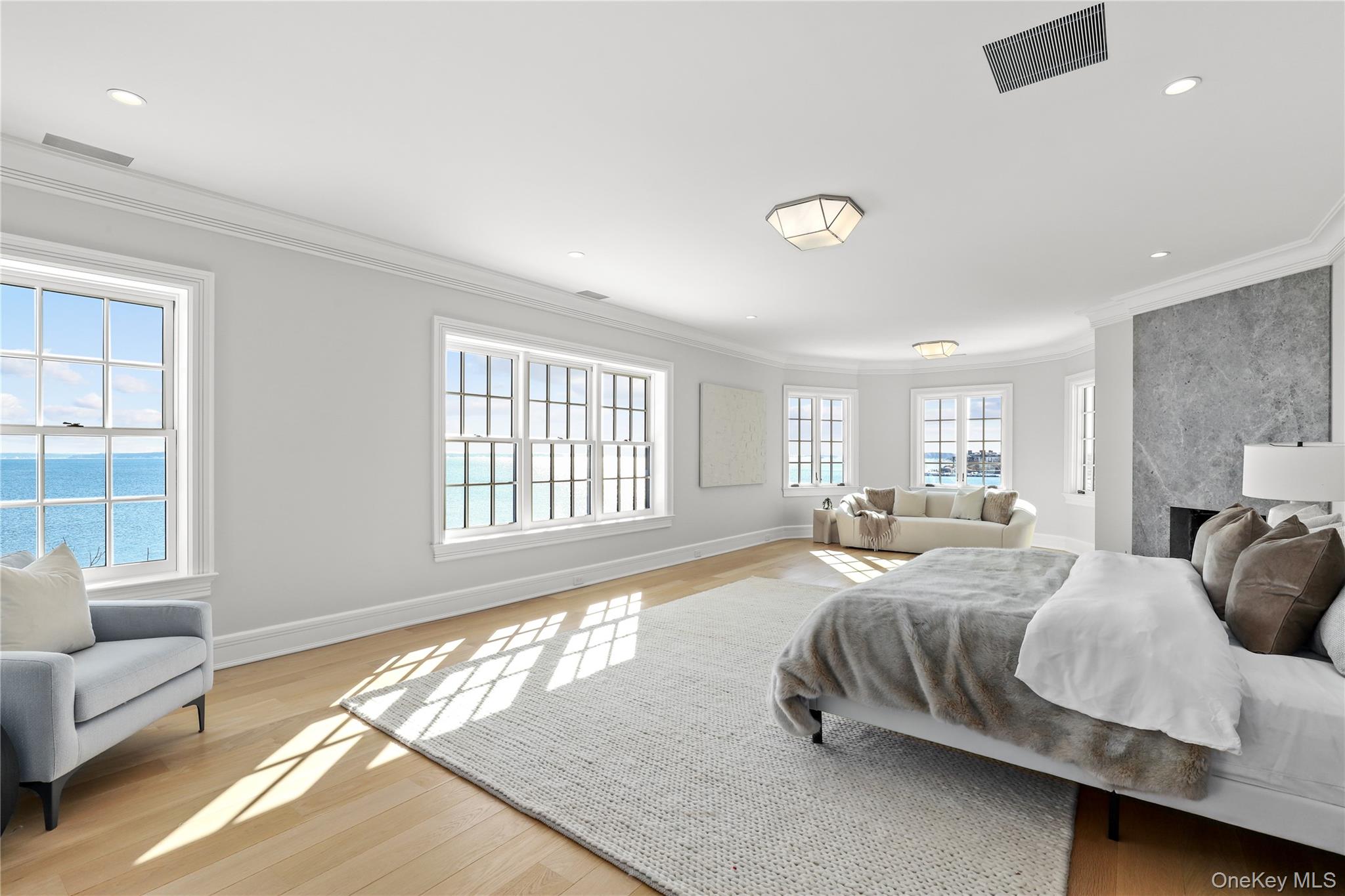 104 Premium Point Larchmont, NY 10538 - Photo 20 of 41 a bedroom with a bed and a couch
