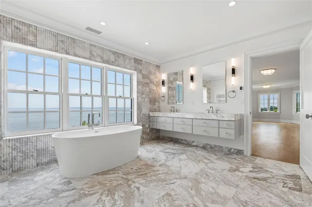 a utility room with sink dryer and washer