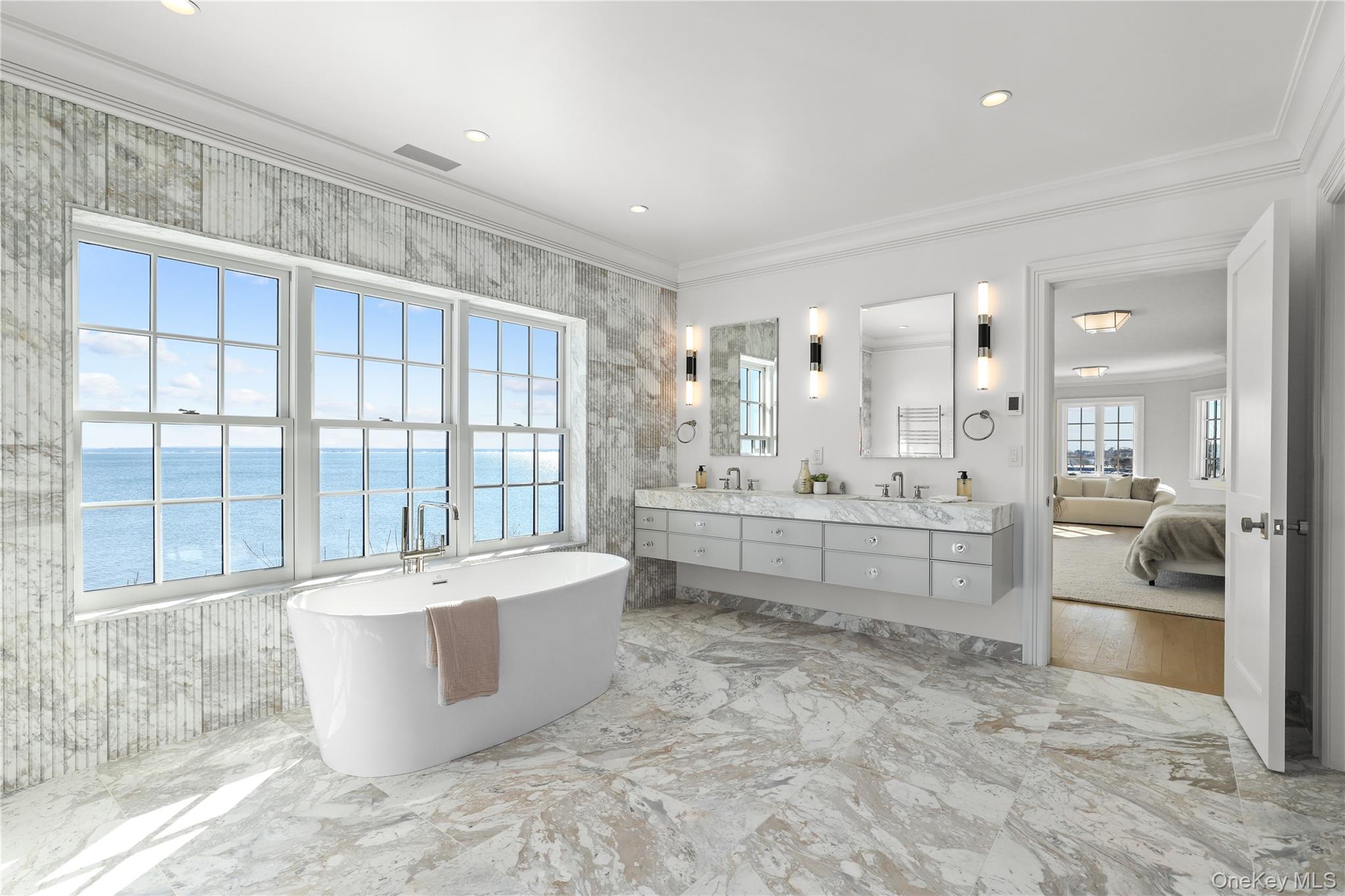 104 Premium Point Larchmont, NY 10538 - Photo 23 of 41 a large room with a large tub and sink