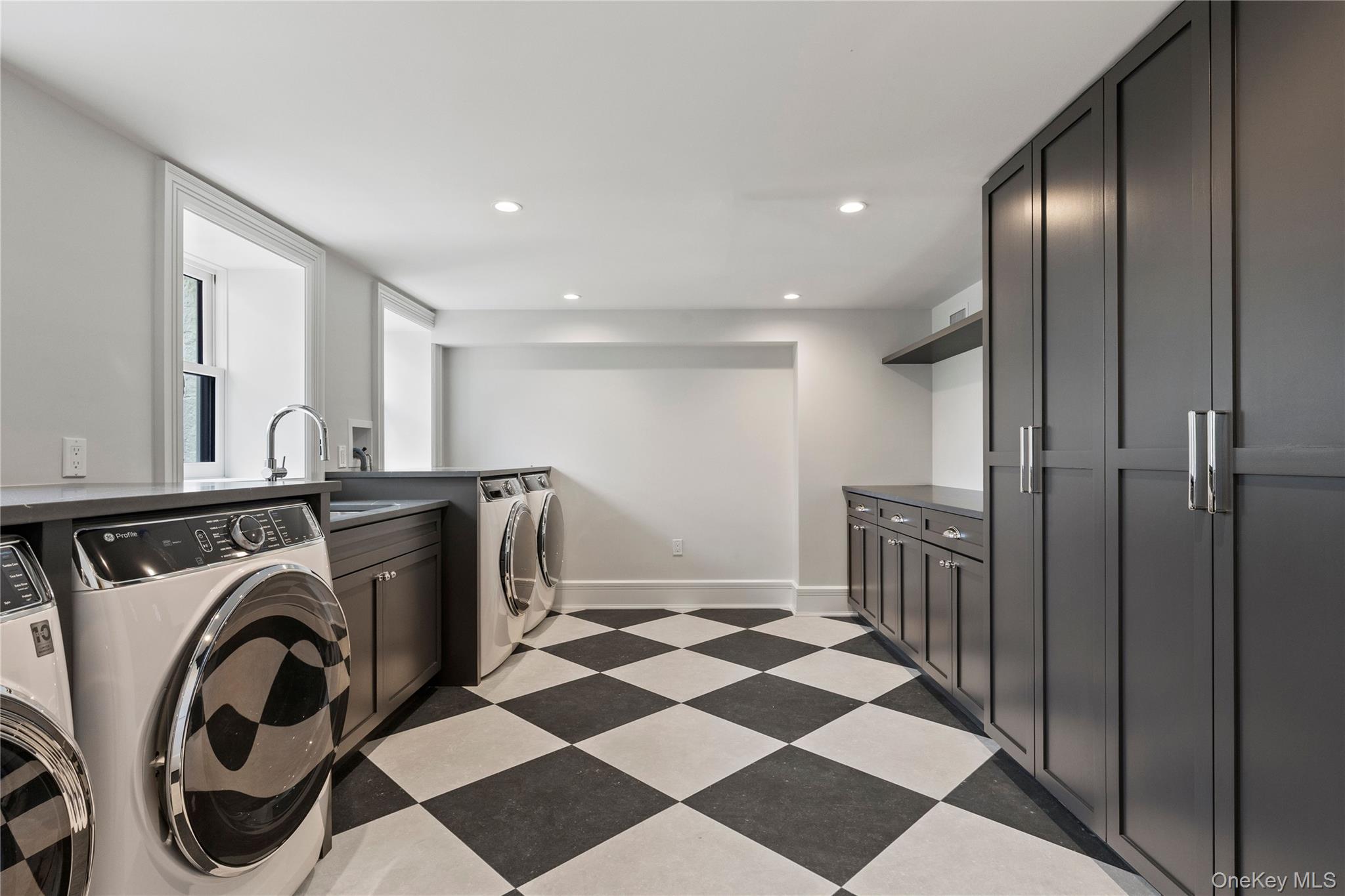 104 Premium Point Larchmont, NY 10538 - Photo 27 of 41 a view of a hallway with washer and dryer