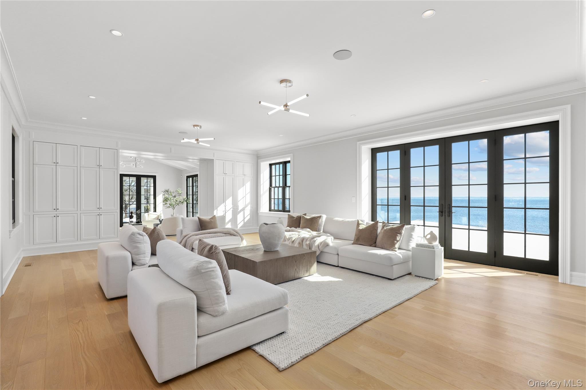 104 Premium Point Larchmont, NY 10538 - Photo 3 of 41 a living room with furniture and a large window