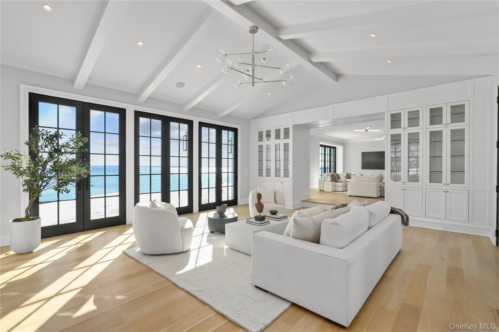 104 Premium Point Larchmont, NY 10538 - Photo 8 of 41 a living room with furniture and a large window