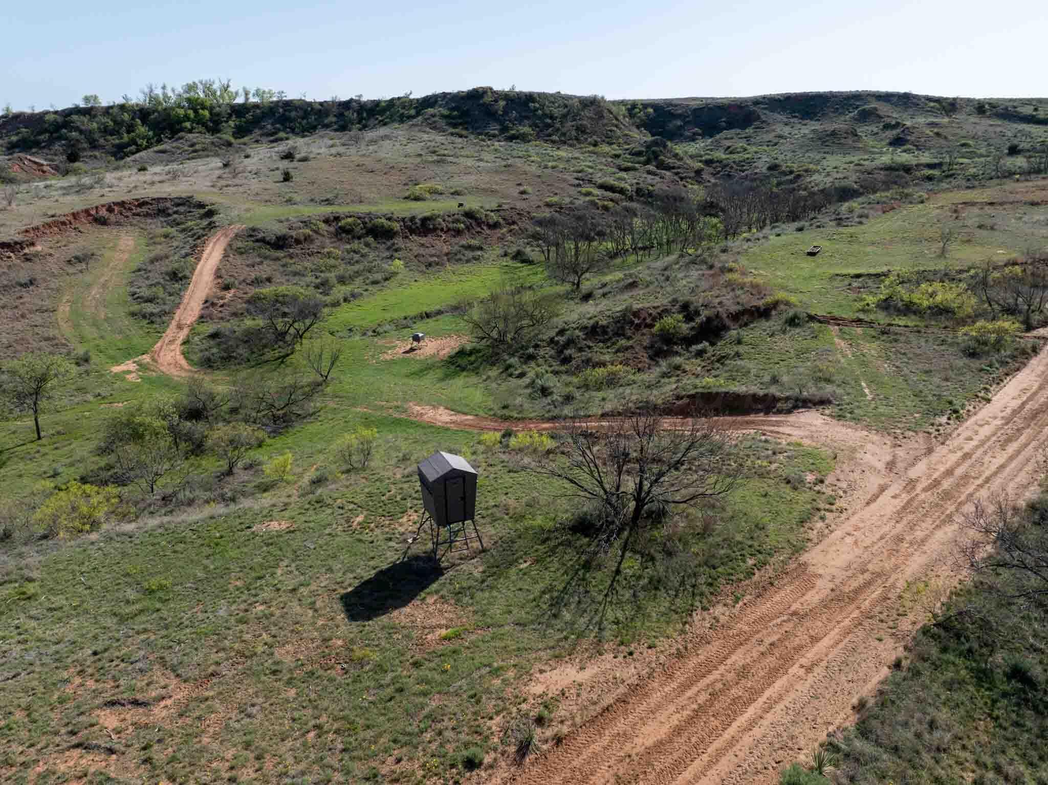 140 Mm Ranch Shamrock, TX 79079 - Photo 12 of 76 a view of a yard with wooden fence