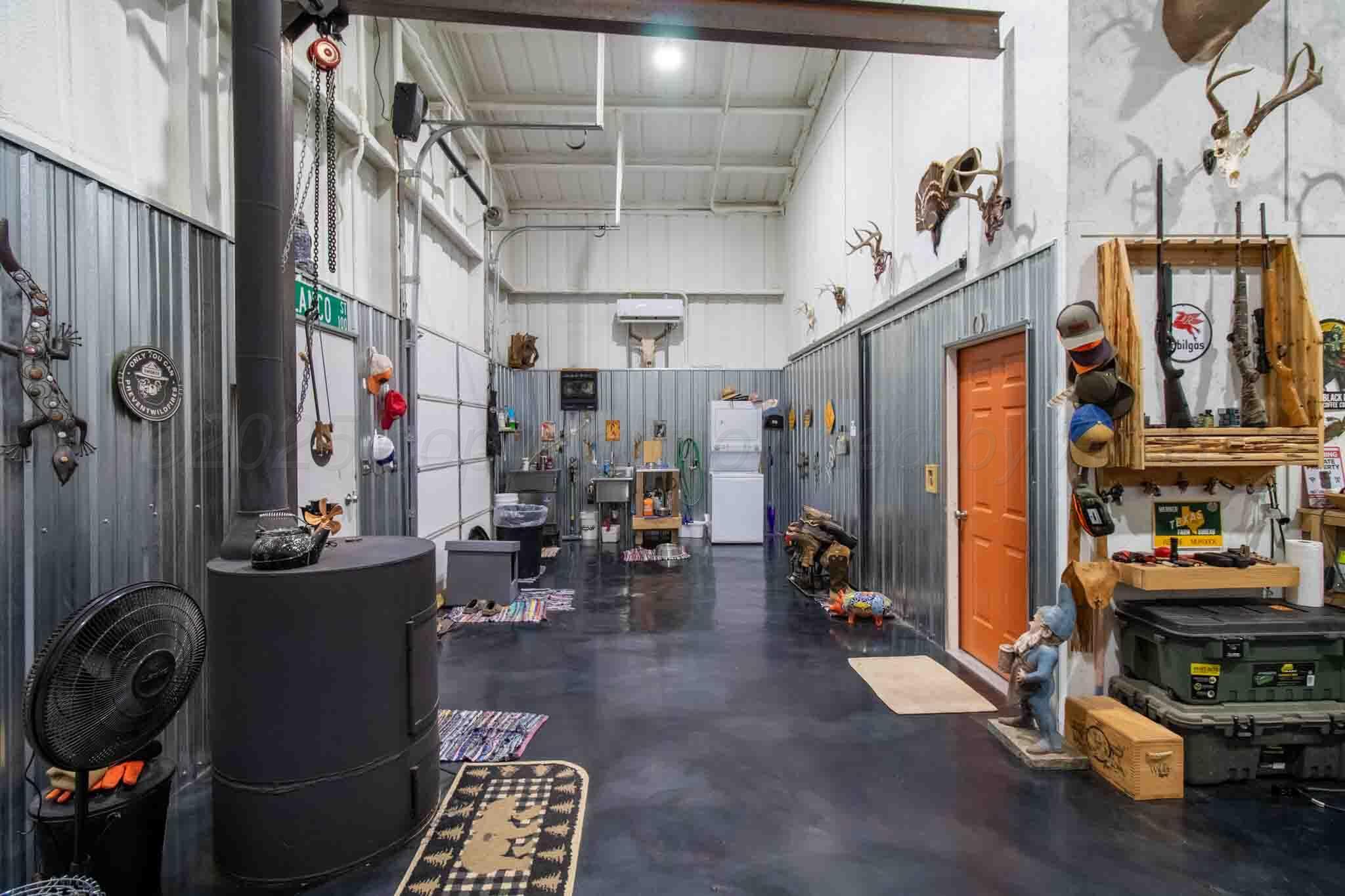 140 Mm Ranch Shamrock, TX 79079 - Photo 24 of 76 a living room with furniture and wooden floor