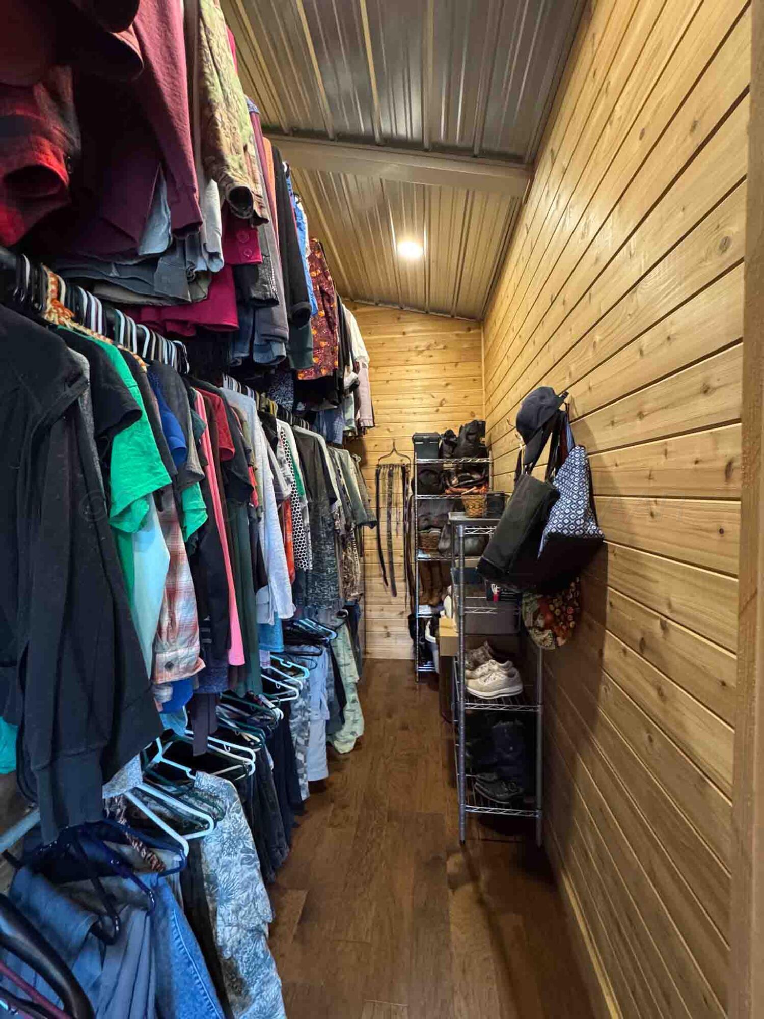 140 Mm Ranch Shamrock, TX 79079 - Photo 35 of 76 a view of walk in closet with clothes
