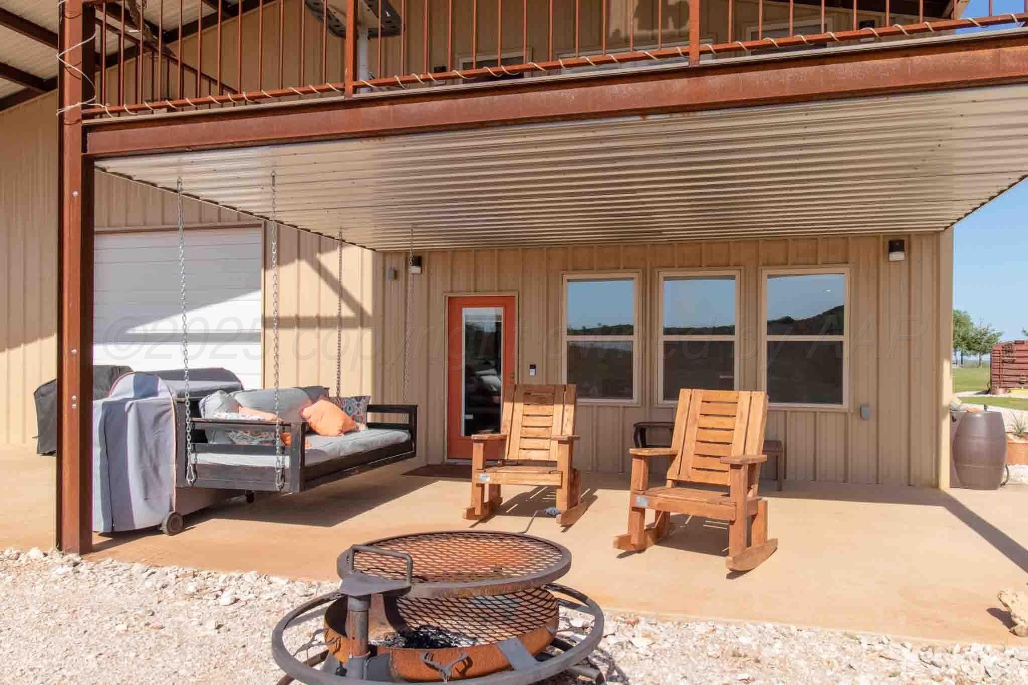 140 Mm Ranch Shamrock, TX 79079 - Photo 45 of 76 a building outdoor space with patio furniture