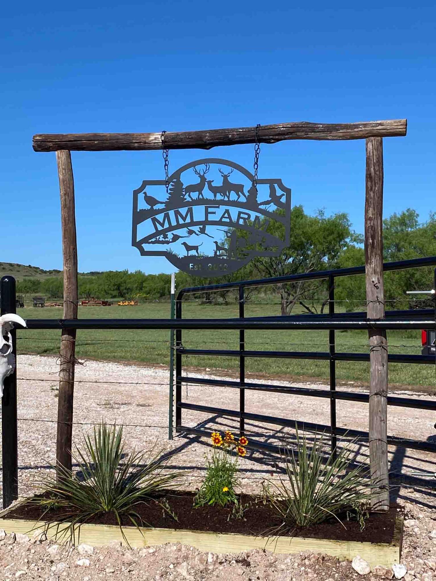 140 Mm Ranch Shamrock, TX 79079 - Photo 65 of 76 a view of a street with wooden fence