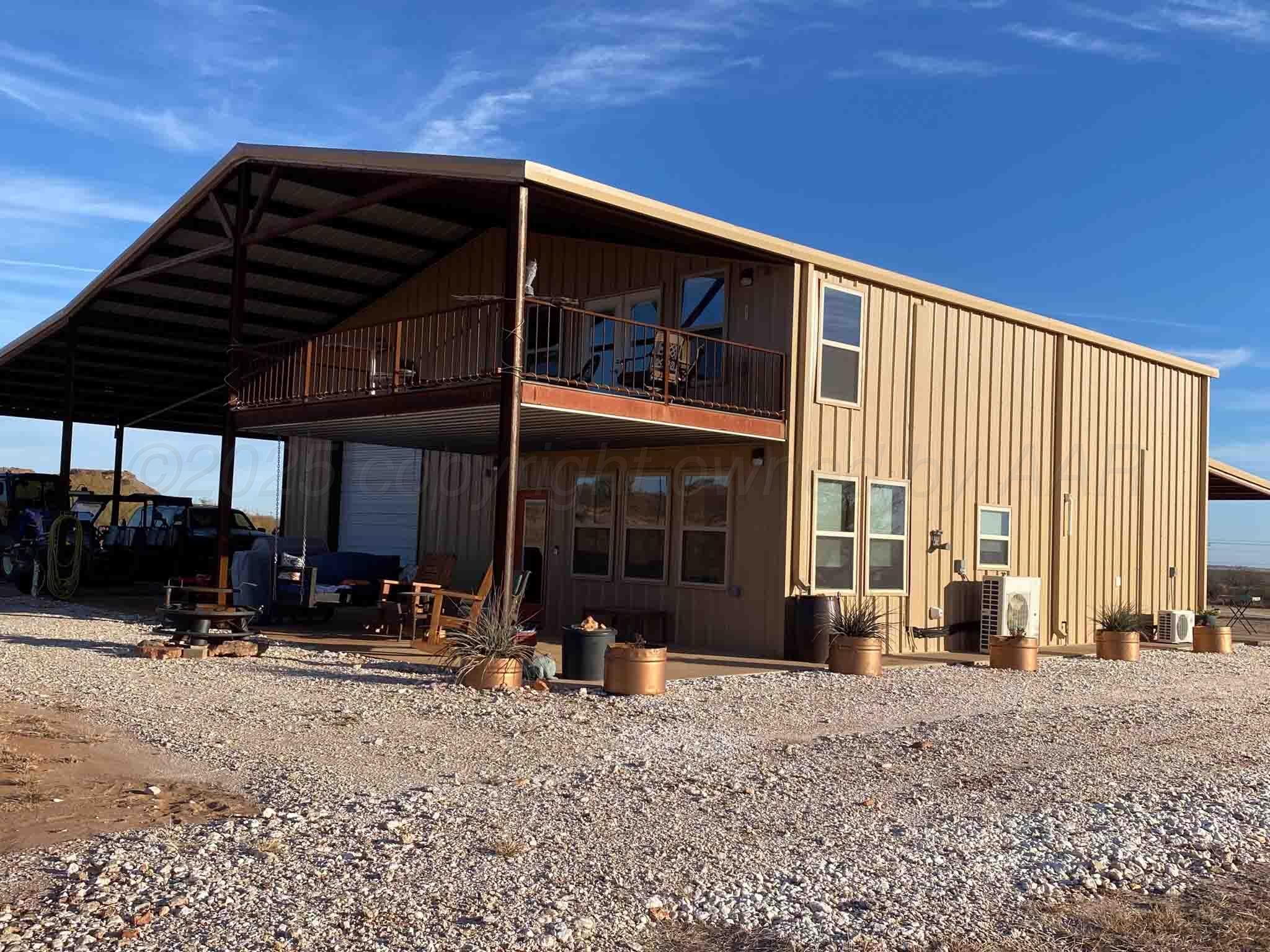 140 Mm Ranch Shamrock, TX 79079 - Photo 69 of 76 a front view of a house with a yard