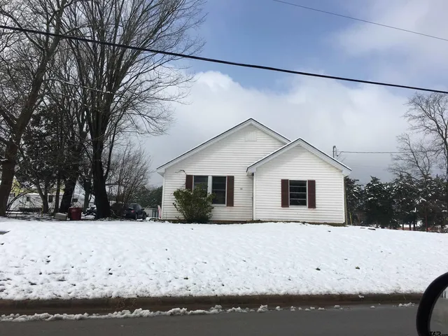a view of snow covered with snow in front of yard