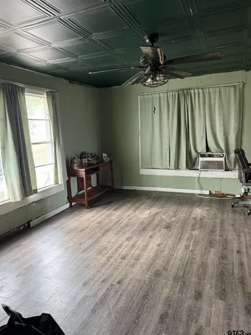 an empty room with windows