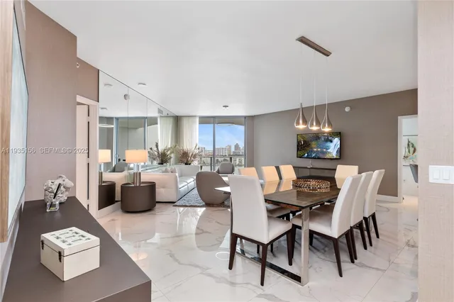 a view of a dining room with furniture